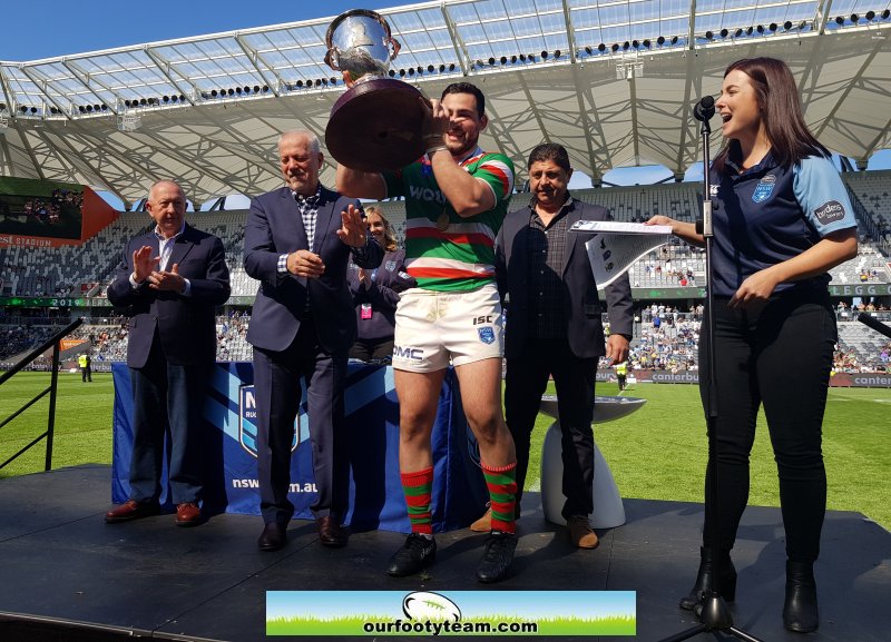 Rabbitoh's Captain Nicholas Mougios with the Jersey Flegg Cup (Photo : Steve Montgomery)
