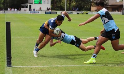 Viliami Penisini dives in the corner for his try against the Sharks in Rnd 2 (photo : Steve Montgomery)