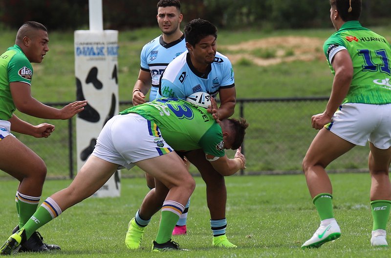 Douglas Levi getting tackled in round 5 of the nswrl SG Ball Cup (Photo : Steve Montgomery)