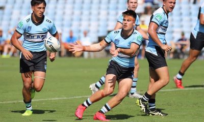 Hooker Kobie Wilson sends the Cronulla Sharks into another attack (Photo : Steve Montgomery)