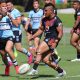 Sione Moala NZ Warriors halfback kicks his team into attack sgBall r4 v Sharks (Photo : Steve Montgomery)