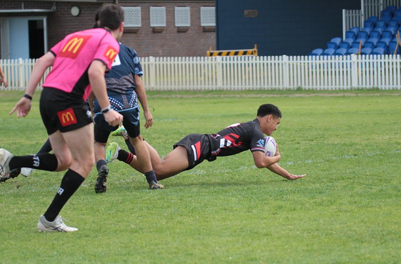Inverson Teo diving in for his 1st try of the Schoolboy Cup Rnd 1 match against Matraville SHS (Steve MOntgomery)