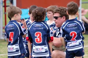 Brisbane Brothers coach Chris Yeo with his team at half-time. Photo: Cameron Stallard/QRL