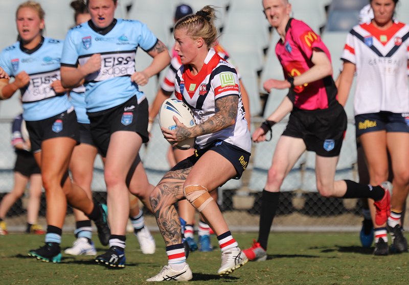 Central Coast Roosters Winger Jayme Fressard looks for a way through traffic atr Campbelltown Stadium in the Semi Final v Cronulla Sahrks (Photo : Steve Montgomery)