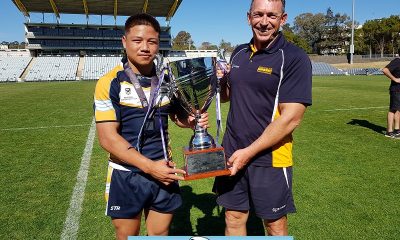Westfields Sports High School Skipper Gordon Chan and Head Coach Mr. Wayne Lamkin holding the 2019 Southern Conference of the National Schoolboy Cup (Photo : Steve Montgomery)