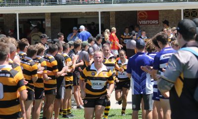 Pic : Amy Barraclough leads the GNT Tiger ladies out into battle with Brooke Davis next in line
