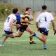 Mitch Hemderson in full flight for the Tigers against the Titans last Saturday. He looms as a major threat against Newcastle Knights on Saturday.