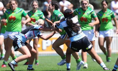 Canberra Raiders tarsha gale Cup fullback Krystal Blackwell tries to smash her way through the Sharks Defense in Rnd 1 in Canberra (Photo : Steve Montgomery)