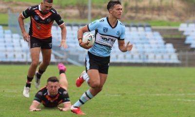 Sharks halfback Ryan Rivett on his way to score one of his 2 tries against the Tigers at Shark Park (Photo : Steve Montgomery)