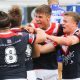 Sydney Roosters players get around Brent Hawkins after he scored the winning try
