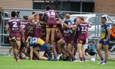 The Manly boys celebrate the match-winning try to Lehi Hopoate (Photo : Jordon Ovington)