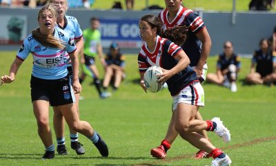 Sydney Indigenous Roosters Tarsha gale Cup halfback Taneka Todhunter tries to find a way through the Sharks line in Rnd 5 at Wyong (Photo : Steve Montgomery)