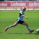 Cronulla Sharks Maddie Studdon kicking one of her 9 goals for the day (Photo : Steve Montgomery)
