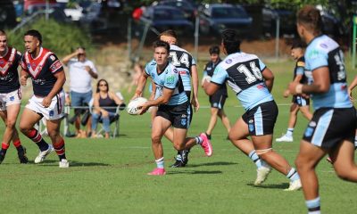 Sharks hooker Kobie Wilson passes the ball to a flying Waylon Fiaii in Round 5 against the Rooster at Wyong (Photo : Steve Montgomery)