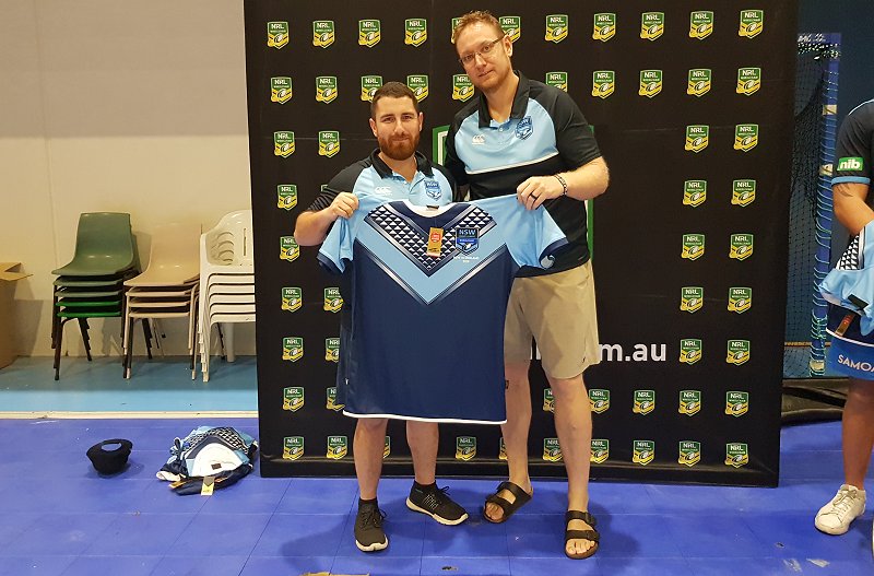Edie george presented with his NSW jersey by NSW & Australian Coach Brett Clark before the NSW v England game at Wollongong Uni in 2019 (Photo : Steve Montgomery)