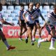 Roosters attacking the Sharks line in Rnd 4 at Shark Park (Photo : Steve Montgomery)