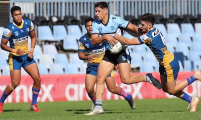 Sharks Jordan Samrani gets the ball stripped by a desperate Joshua Chappell in Rnd 7 at Shark Park (Photo : Steve Montgomery)