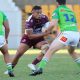 Manly SG Ball winger Uluaki Tuipulotu runs the ball from the danger zone (Photo : Steve Montgomery)