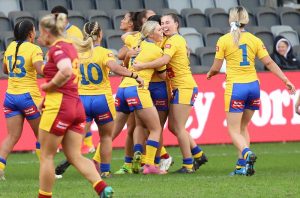 City girls celebrate Corban Baxter's try at Bankwest Stadium (Photo : Steve Montgomery)
