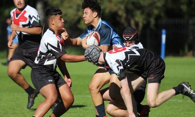 Daily Telegraph reporter Willams Tyson interviews Illawarra SHS players James Walsh (L) and Viliami Mahe (Photo : Steve Montgomery)