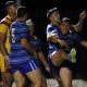 Patrician Brothers Fairfield celebrate a try in their narrow win against Holy Cross College. Picture: Jonathan Ng