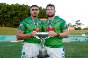 Canberra Raiders Co-Captains Trey Mooney and Clay Webb proudly holding the 2021 SG Ball Cup (Photo : Bryden Sharp bsphotos.com.au)