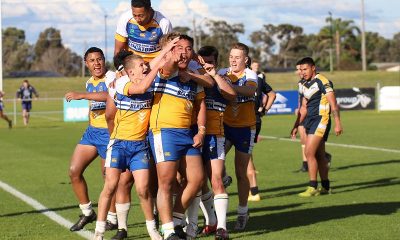 Tevita Alatini celebrating his try with Patrician Brothers Blacktown teammates in their victory over Westfields SHS. (Photo : Steve Montgomery)