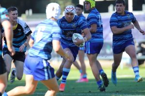 Terence Lafai steamrolls his way forward for Patrician Brothers (Photo : Steve Montgomery)