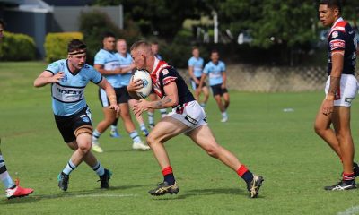 Central Coast Roosters SG Ball player Zac Montgomery runs the ball at the Sharks defence (Photo : Steve Montgomery)