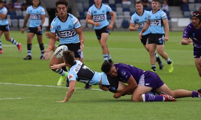 Sharks halfback unloads to a flying Siteni Taukamo in rnd 4 at Mars Stadium, Ballarat vic (Photo : Steve Montgomery)