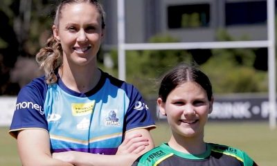 Karina Brown with Helensvale Hornet player Jenna. Photo: Gold Coast Titans