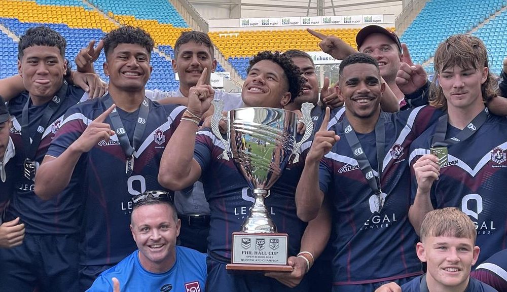 Ipswich SHS captain Josiah Pahulu, middle, and his team mates Picture Jerad Williams