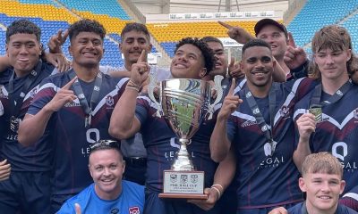 Ipswich SHS captain Josiah Pahulu, middle, and his team mates Picture Jerad Williams