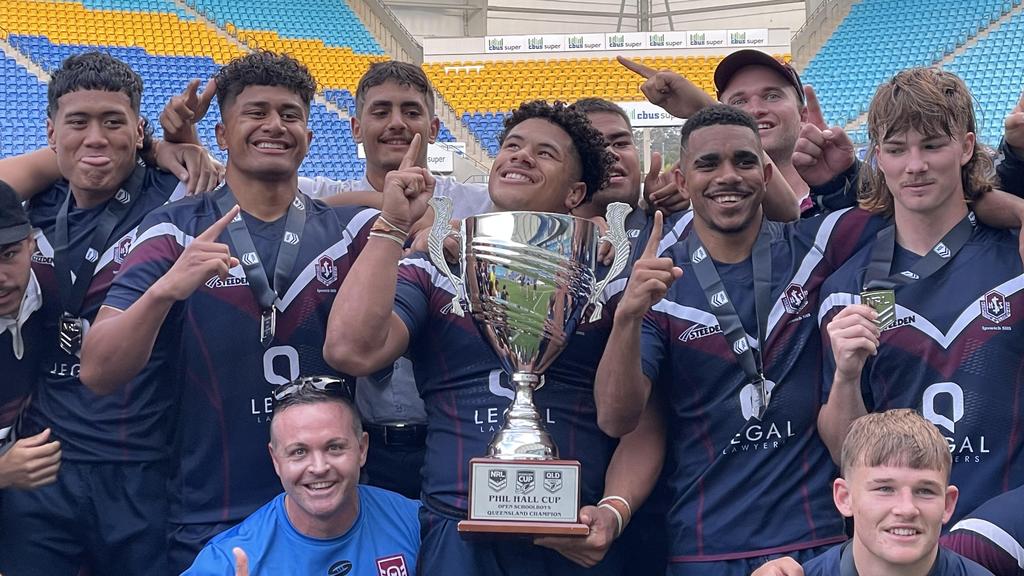 Ipswich SHS captain Josiah Pahulu, middle, and his team mates Picture Jerad Williams