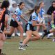 Sharks Lisa Fiaola Cup Five-eight Olivia Herman runs through the Weststigers defence during yesterday's Gala Day at Tuggerah (Photo : Steve Montgomery)