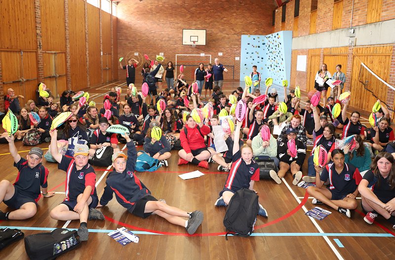 Kempsey High School Year 7 students with their footys (Photo : Steve Montgomery)