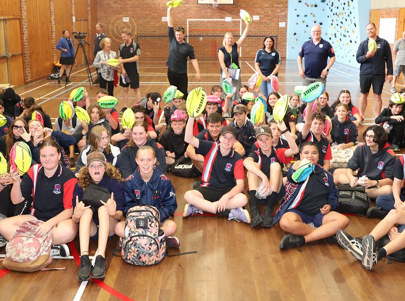 Kempsey High School Year 7 students with their footys (Photo : Steve Montgomery)