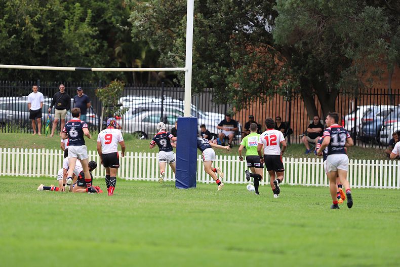 HMC trial ROOSTERS v DRAGONS