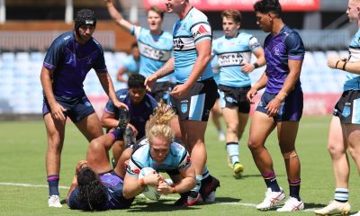 Samuel McCulloch scores despite the best efforts of the Storm's Josiah Ekkehard Neli in the SG Ball Cup. Picture: Steve Montgomery/Ourfootyteam.com