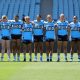 Cronulla Sharks HNWP team line up for the Welcome to Country talk (Photo : Steve Montgomery)