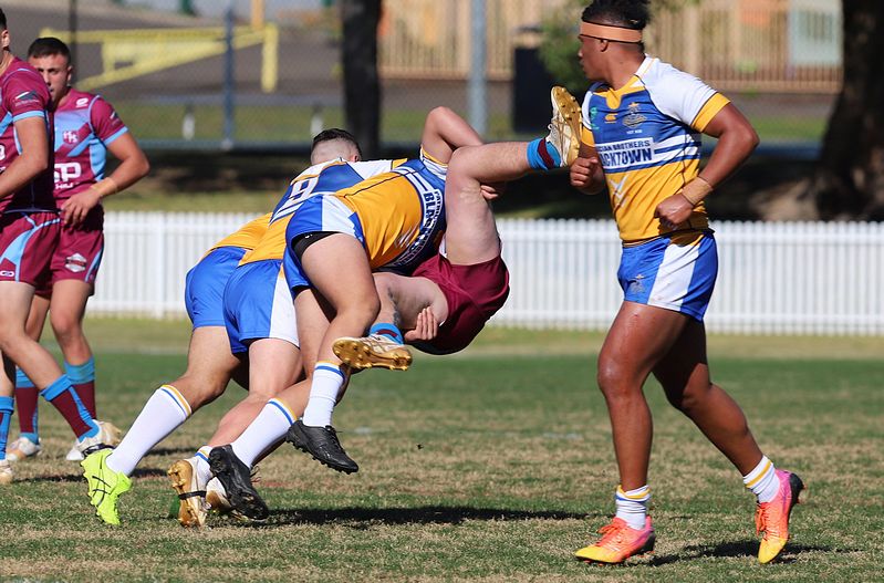 Hills ran into a determined opponent in Patties, Blacktown. Pic: Steve Montgomery