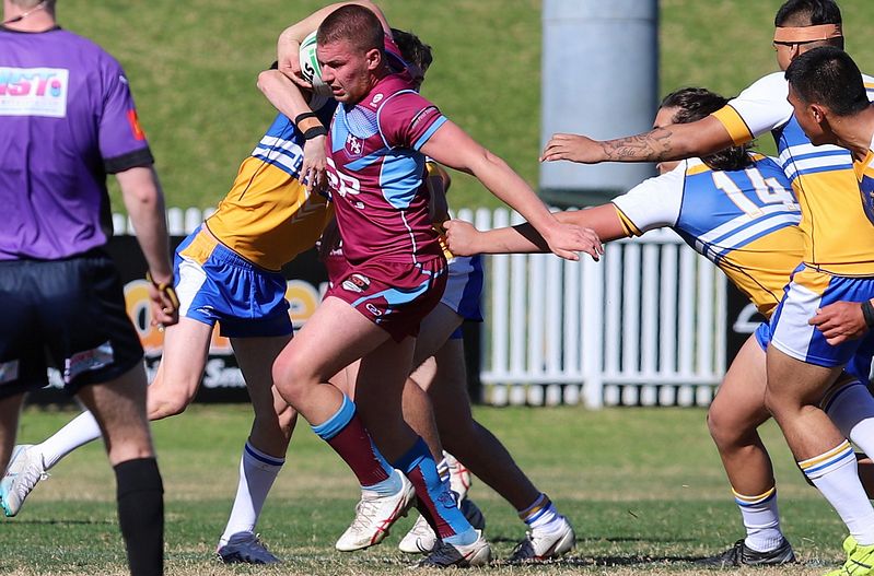 Hills ran into a determined opponent in Patties, Blacktown. Pic: Steve Montgomery