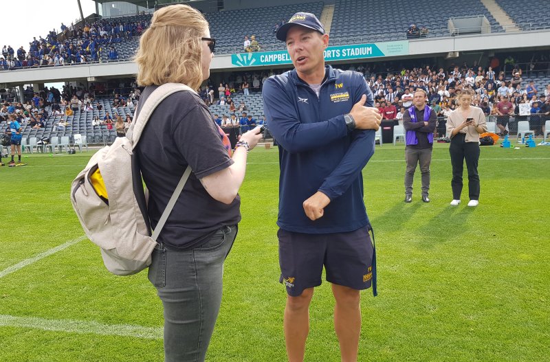 Newscorp's Katrina May interviewing Westfields coach Mr Troy Wedden (Photo : Steve Montgomery)