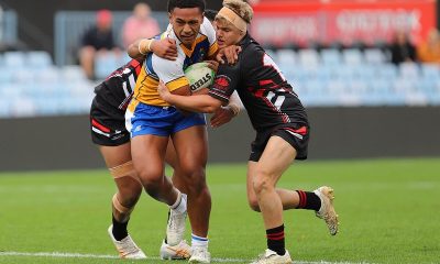 Marcellus Iakopo bursting through to score for Patrician Brothers. Photo: Steve Montgomery